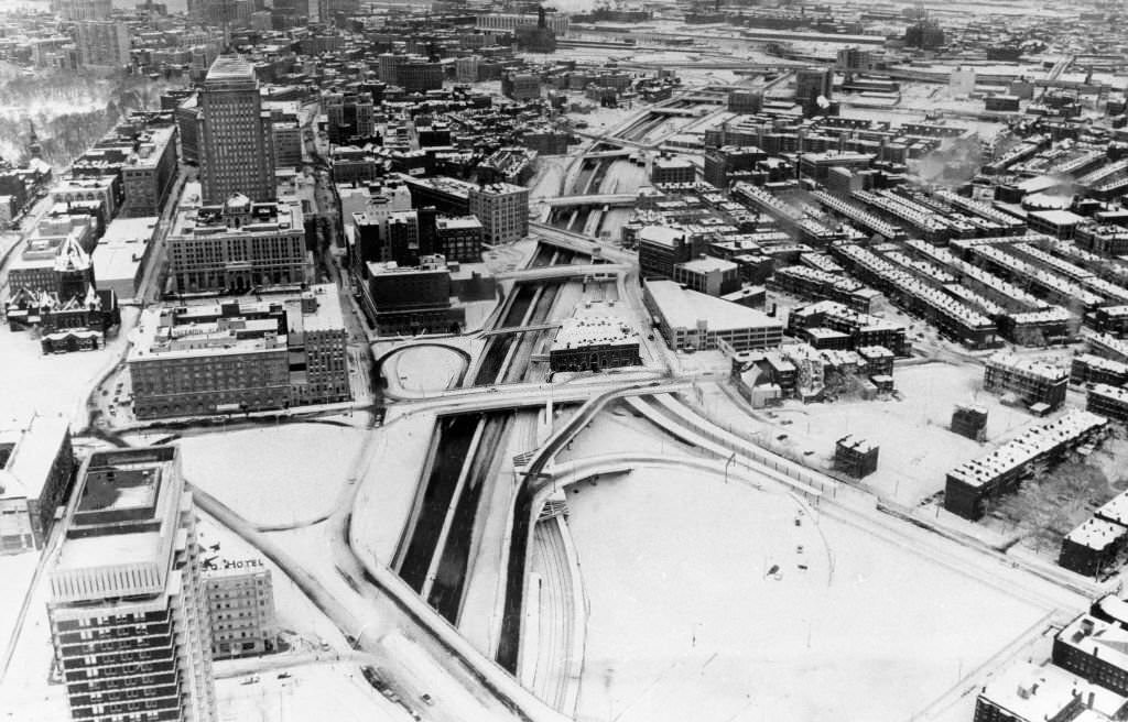 An aerial view of a snow covered Boston looking towards South Station from the top of the Prudential Tower, 1969.