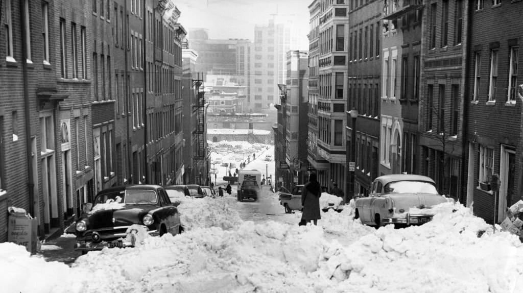 Grove Street in Beacon Hill is covered in snow, 1960.