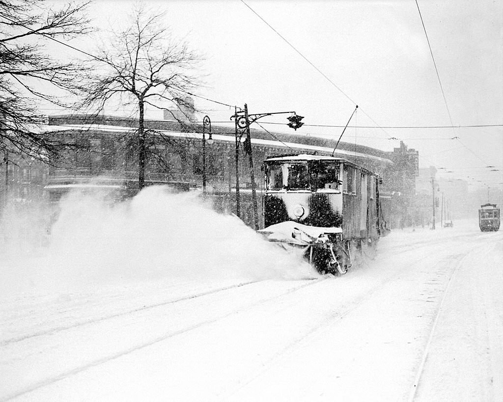 Plop, plop, plop goes the snow from trolley tracks at 168th