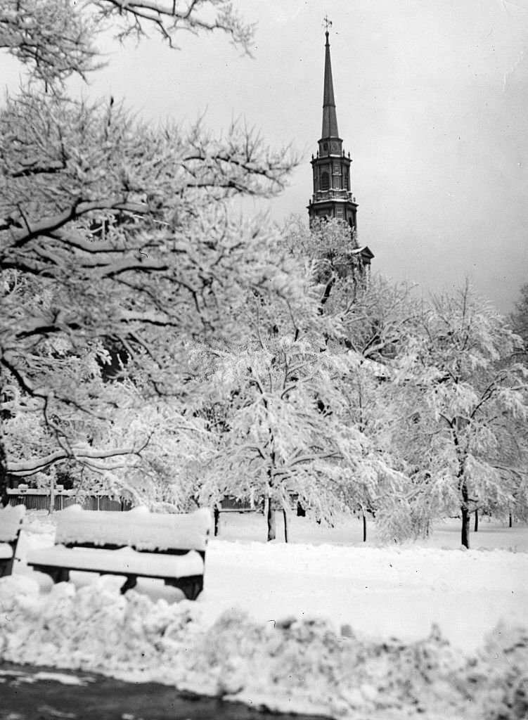 Boston Common, looking towards Park Street Church, is covered in snow, 1933.