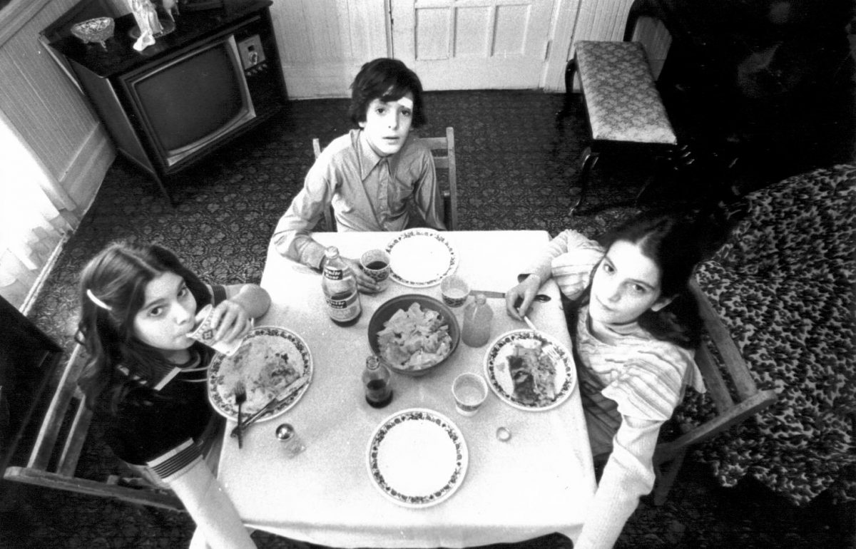 Thanksgiving 1975 kids table Cousin Wanda, Brother John with band-aid & cousin Noele in our parlor.