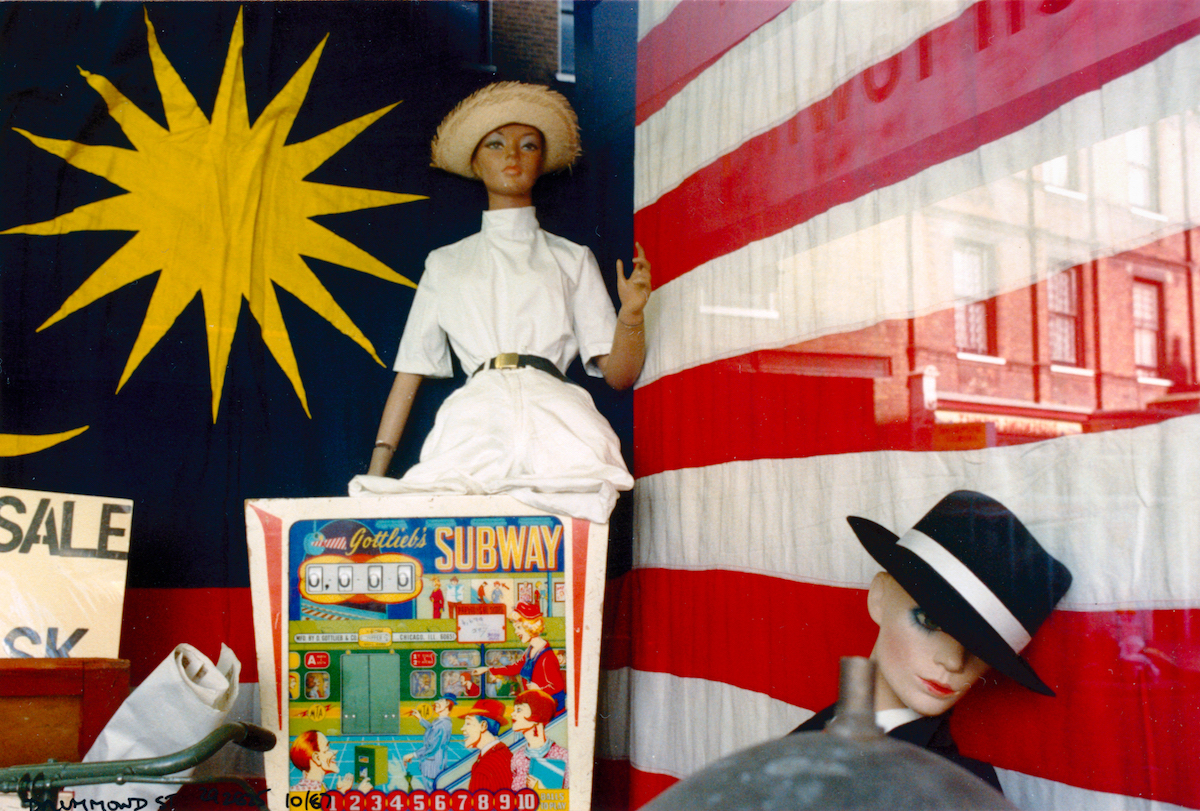 Shop window, Drummond St, Euston, Camden, 1987