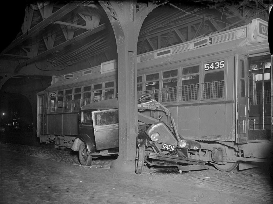 Car crushed by trolley - North Hampton and Washington Sts, 1932