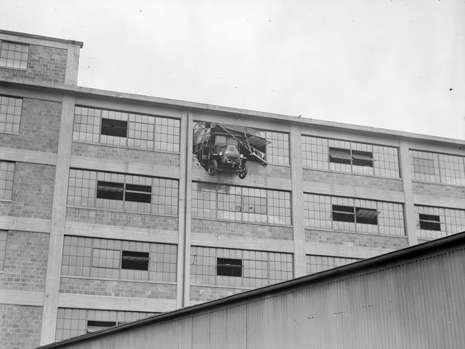 Truck crashes through garage several stories up East Cambridge, 1938