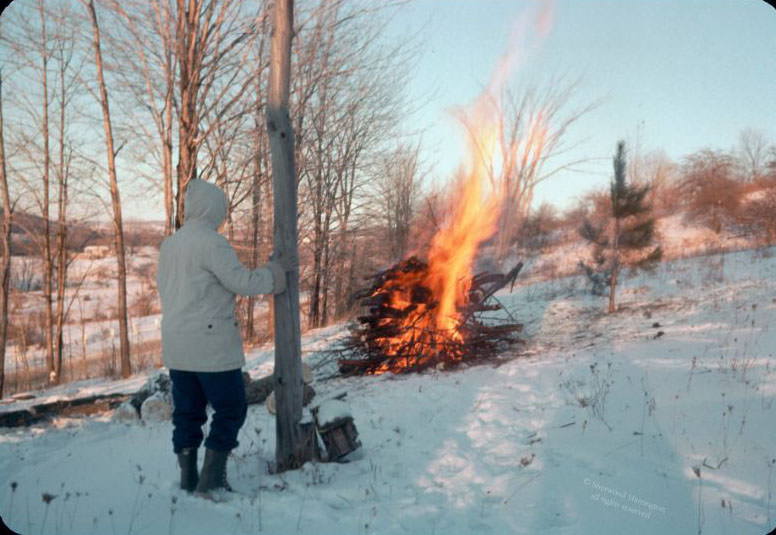 At the end of the day, we had a bonfire of trimmings from around the yard. February 1962