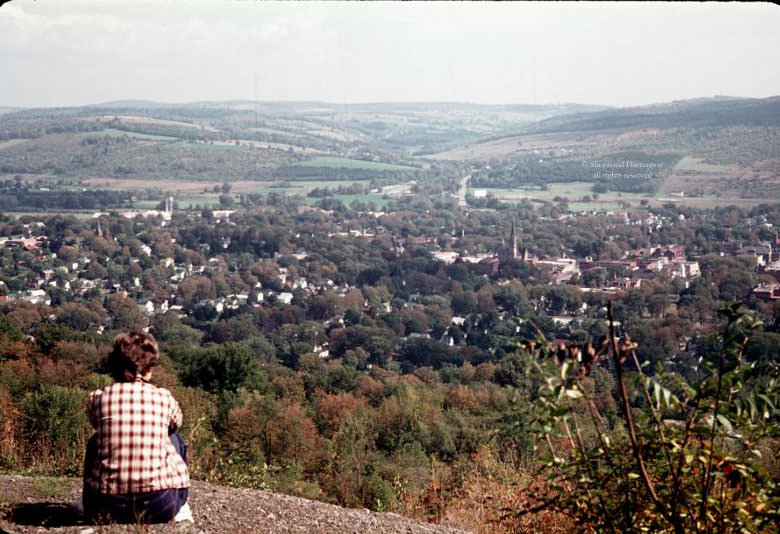 Mom at the West HIll quarry, looking down on Norwich, September 1965