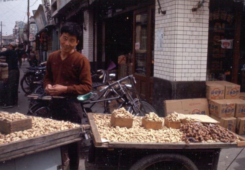 Peanut vendor, Tague, 1970s