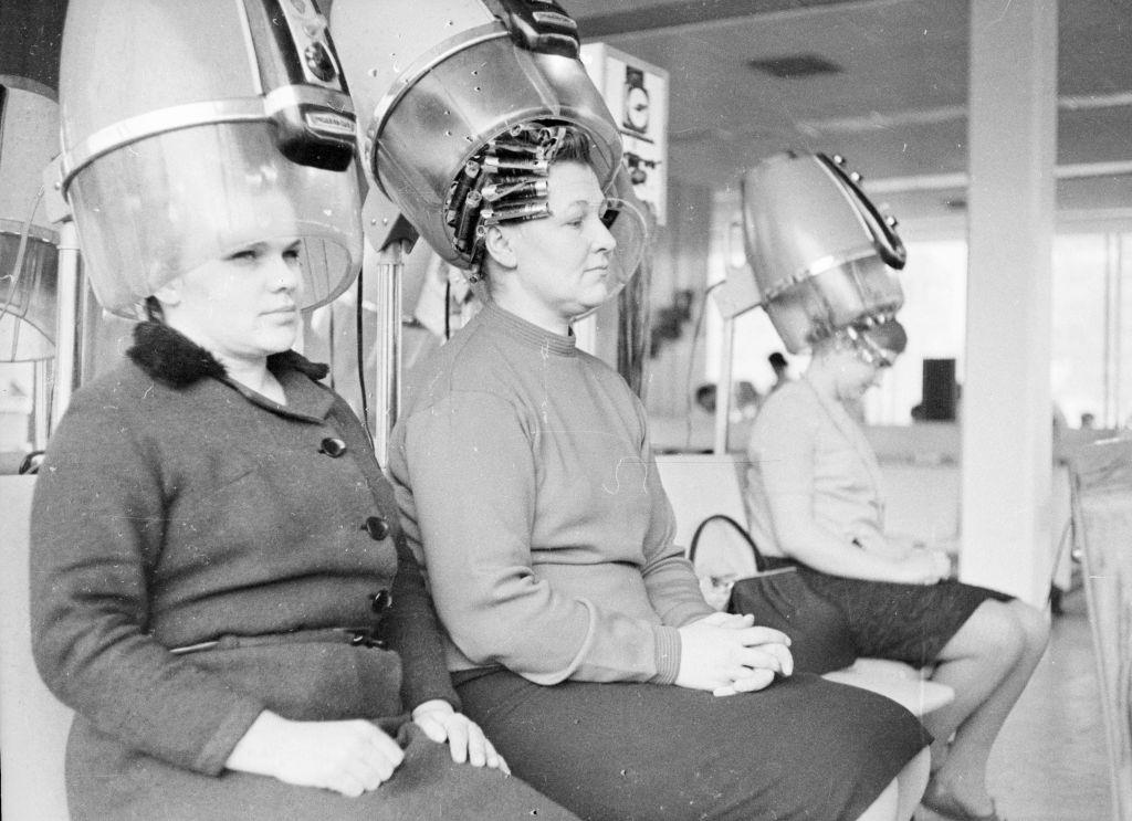 Russian women relax under the dryers in the Moscow Beauty Palace, 1965