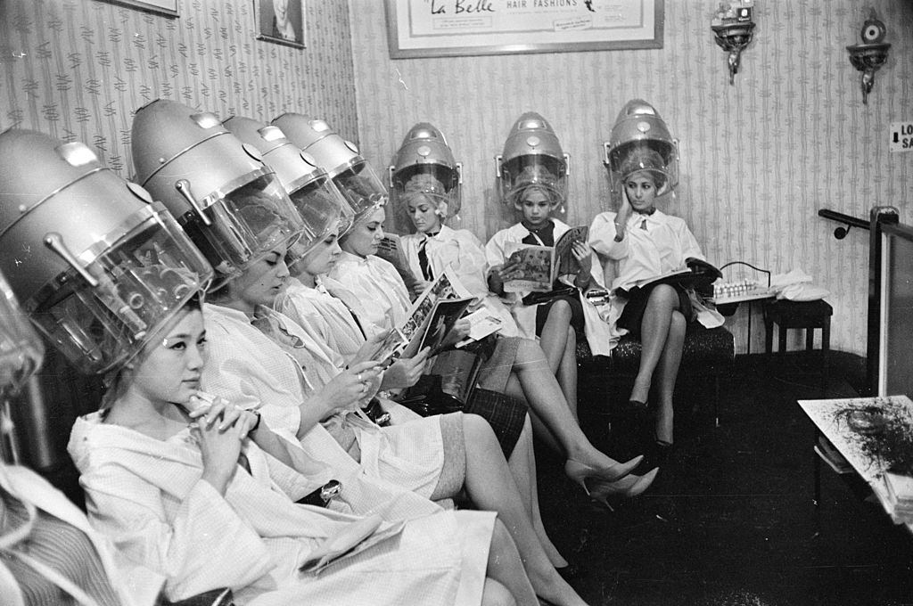Miss World Contestants visit a hairdresser before the big event, 1963