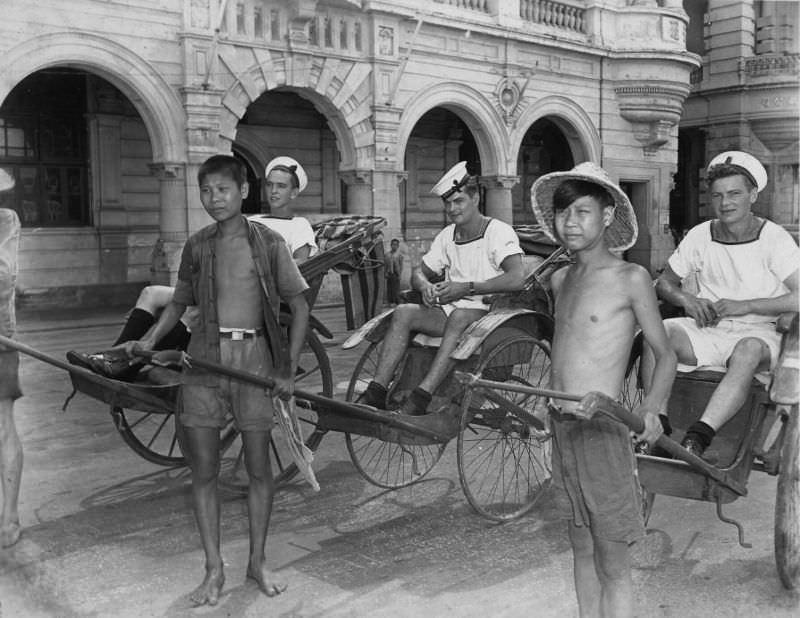 Boys from ship rickshaw ride in Hong Kong, August 31, 1945