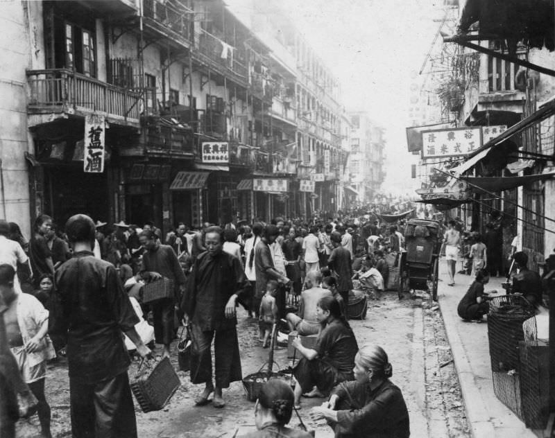 Centre Street at Sai Ying Pun, looking towards Des Voeux Road West from the junction with Queen's Road West, Hong Kong, August 1945