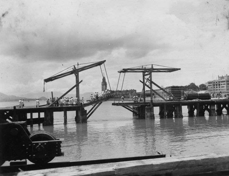 Crossing drawbridge in Kowloon, August 31, 1945
