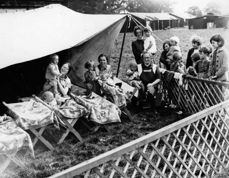 Salvation Army workers look after the children of hop pickers, 1936.