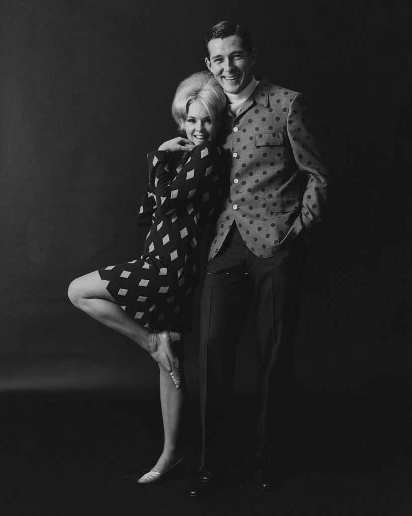 Joey Heatherton posing with a male model