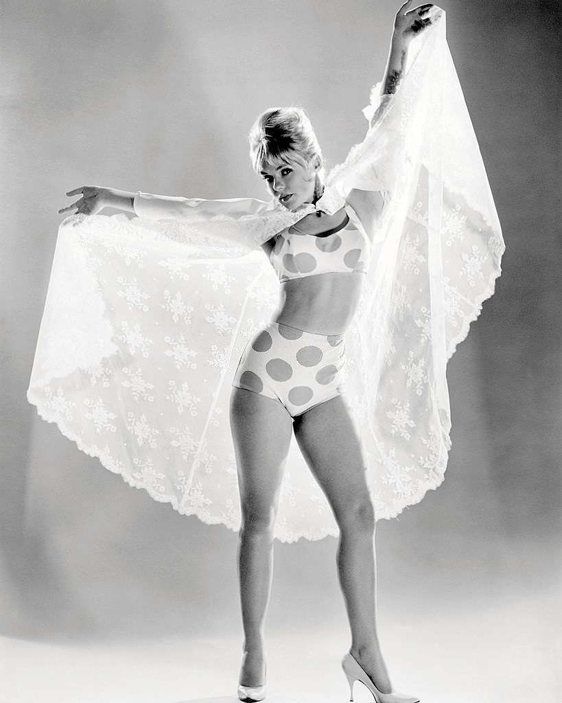 Joey Heatherton posing in a white negligee and a polka-dot bikini, circa 1965.