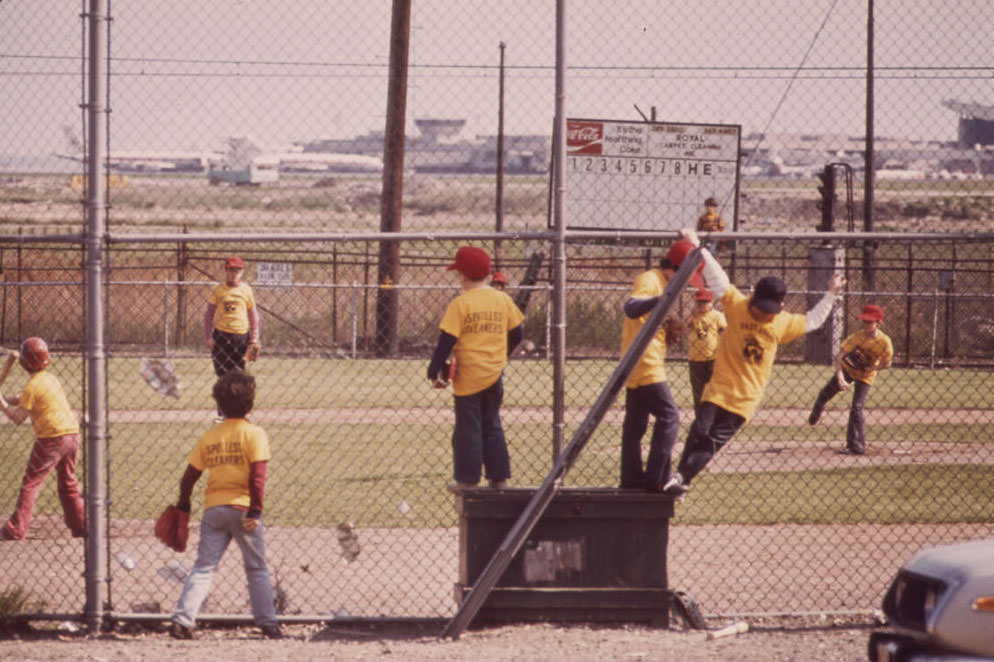 Logan Airport Area. Little League Game on Land Loaned by Massport (Massachusetts Port Authority) near Bennington Street East Boston's Main Thoroughfare.