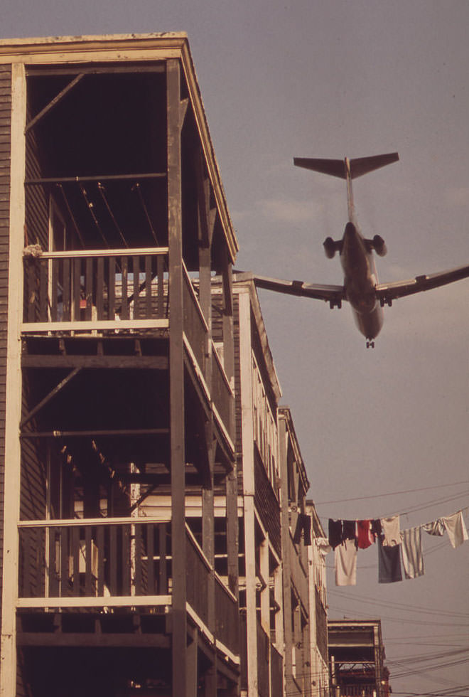 Near Logan Airport - Airplane Coming in for a Landing Over Neptune Road Backyards, 1973