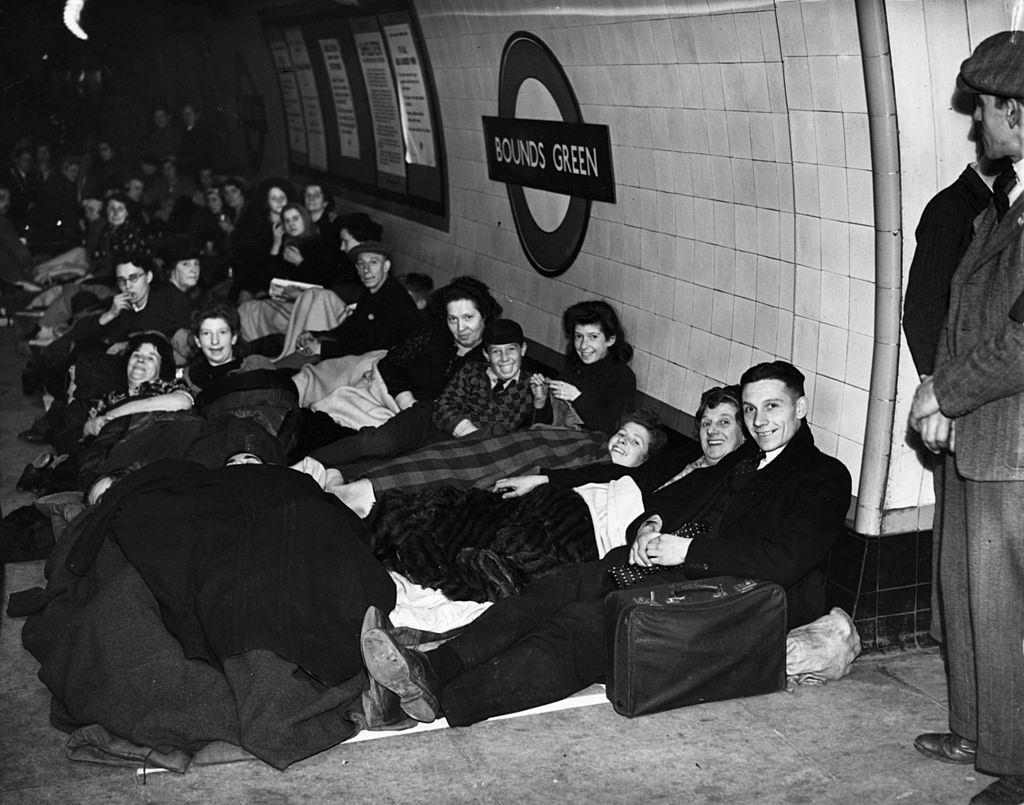 Londoners sheltering on a platform at Bounds Green tube station during an air raid in The Blitz.