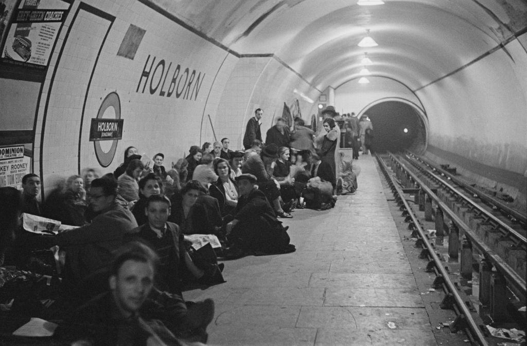Wartime view of Londoners seeking shelter and bedding down on the platform at Holborn underground station to escape from German Luftwaffe air raids.