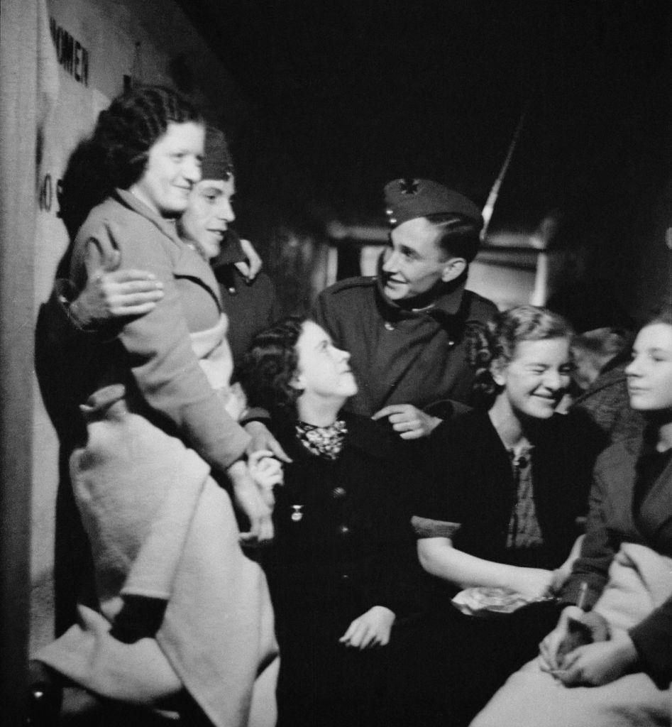 A group of people in an air raid shelter during the Blitz, London, October 1940.