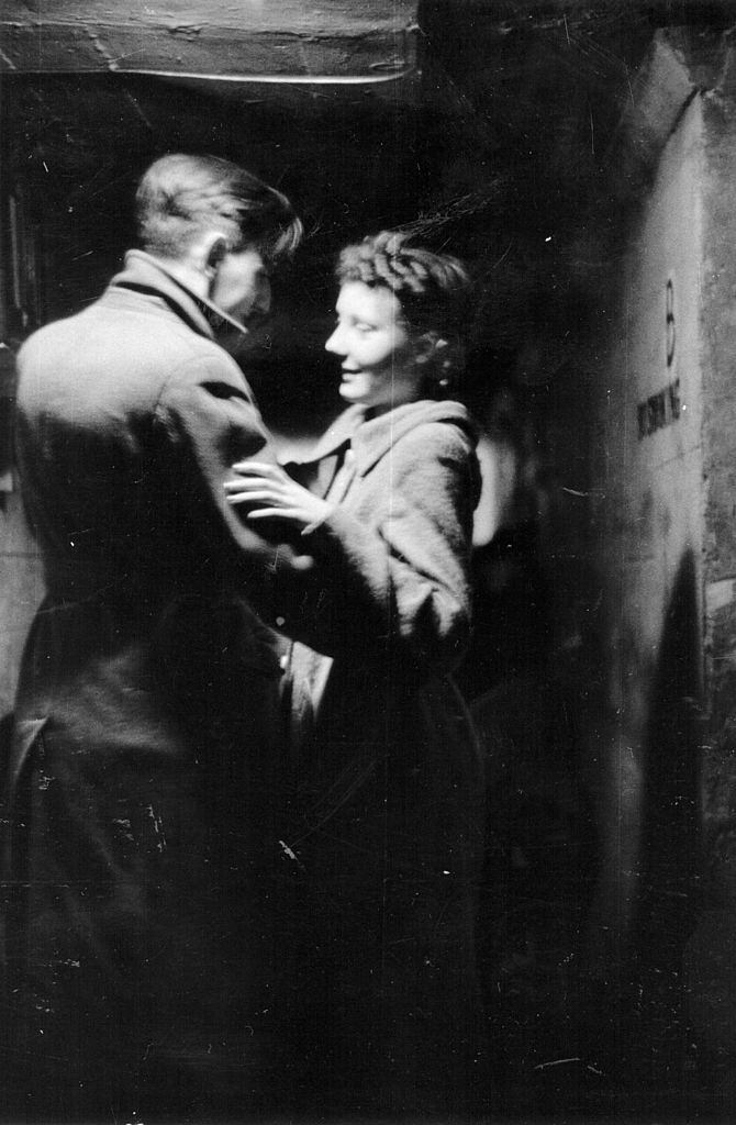 A couple in an air raid shelter during the Blitz, London, October 1940.