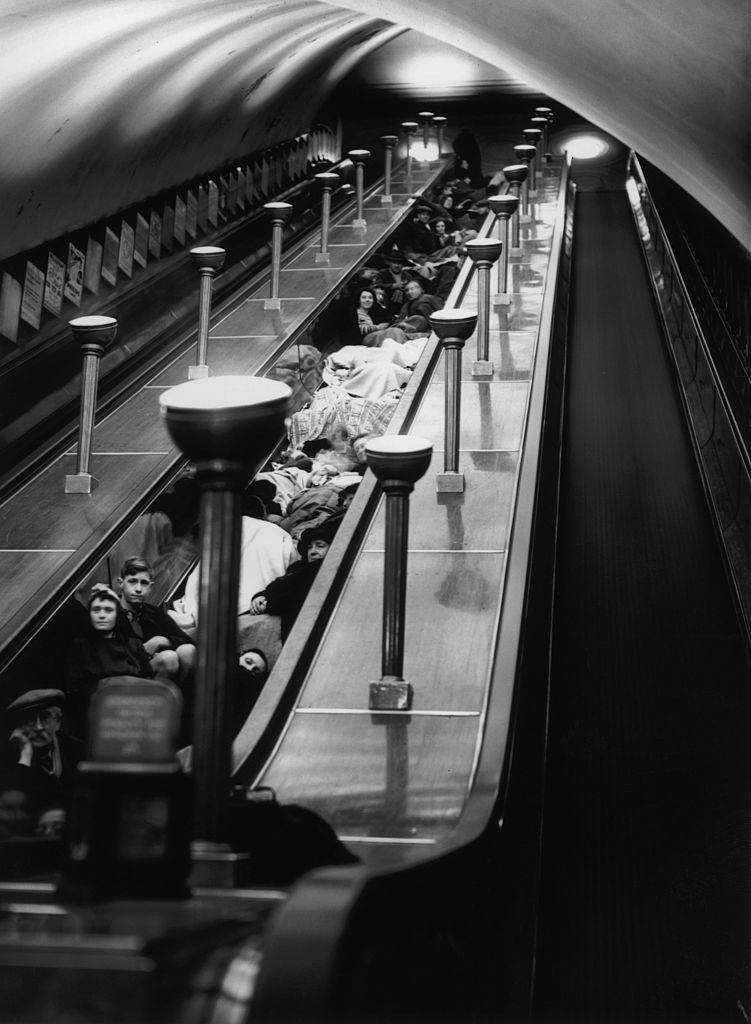 Londoners shelter from air raids in an underground station during World War II, 1940.