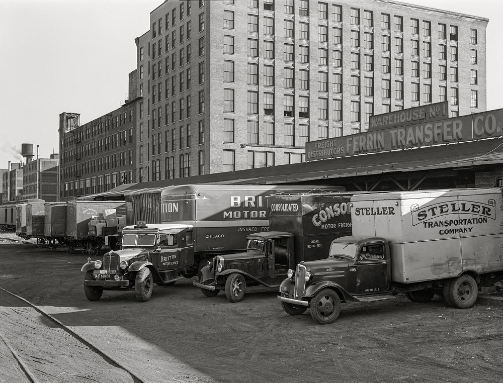 Trucks loading at terminal warehouse, Minneapolis, Minnesota, September 1939