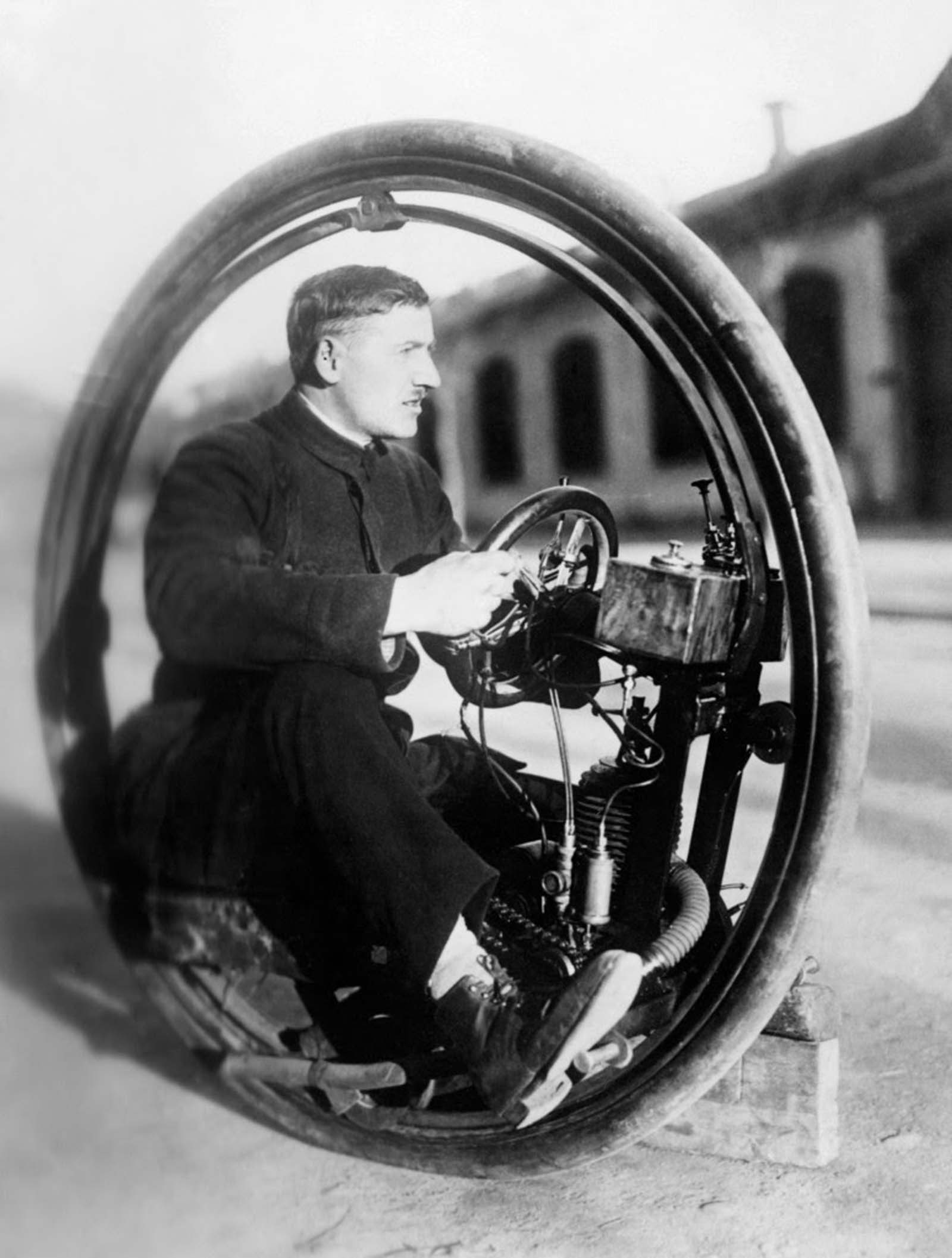 Signor Davide Cislaghi with his one wheel motorcycle called the “Monowheel” which was capable of speeds up to 40 mph, 1923.