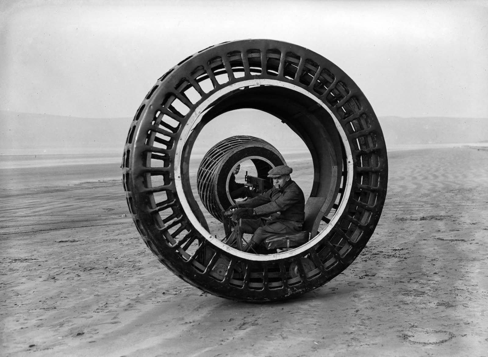 Electronically driven wheels which revolve while the drivers remain stationary are tested at Bream Sands, Weston-super-Mare, Somerset, England, 1932.