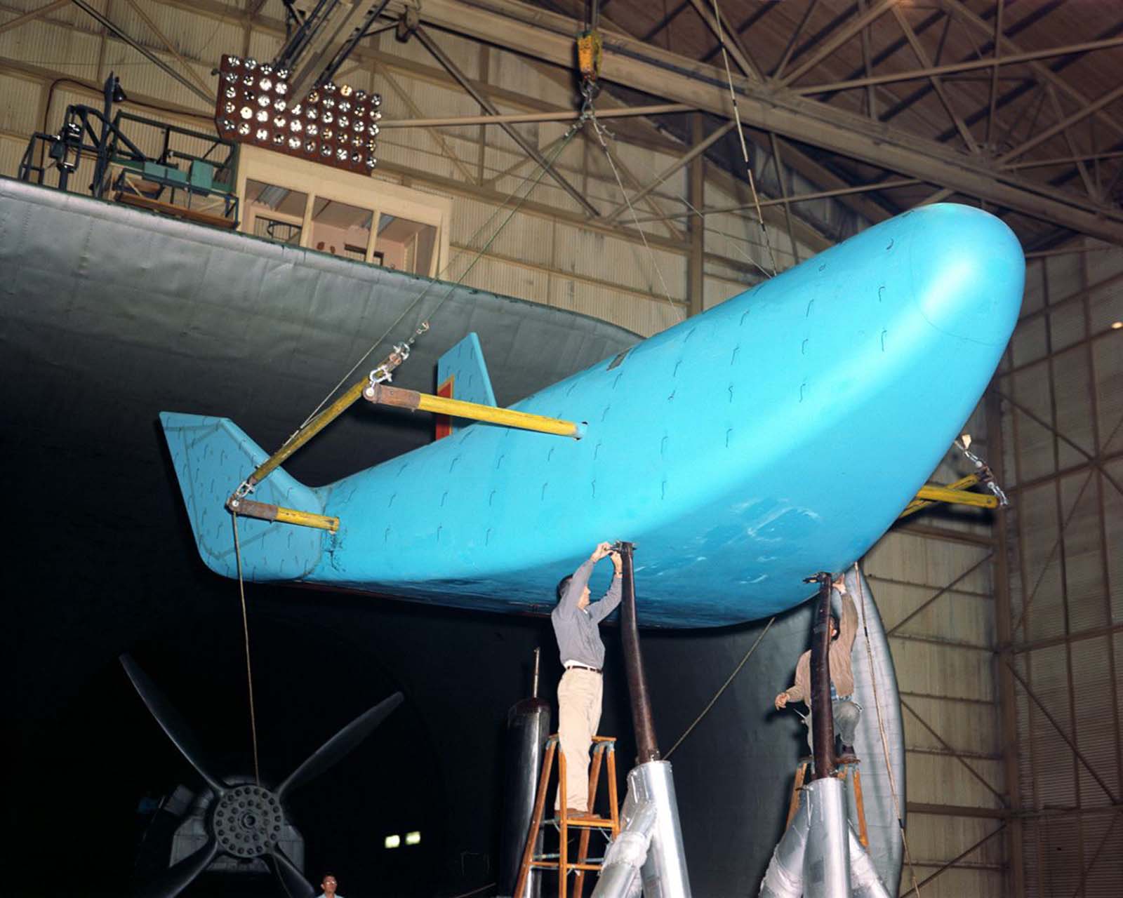 A full scale model of the HL-10 lifting body mounted in the 30 x 60 Full Scale Tunnel at Langley, 1964.