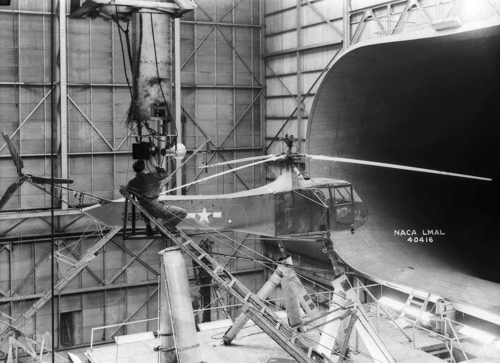 A Sikorsky YR-4B/HNS-1 helicopter, the first mass-produced chopper, in the 30 x 60 Full Scale Tunnel, 1944.
