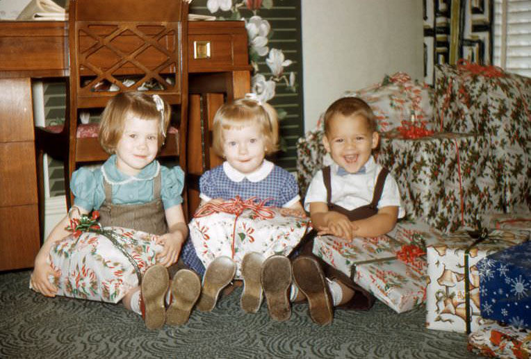 Children with Christmas presents, USA, 1950s