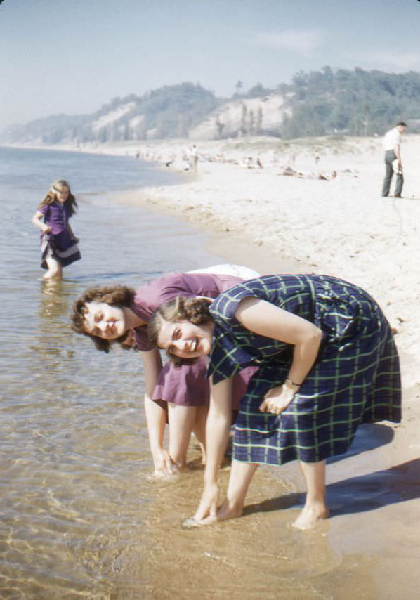 Young women at beach, USA, 1950s