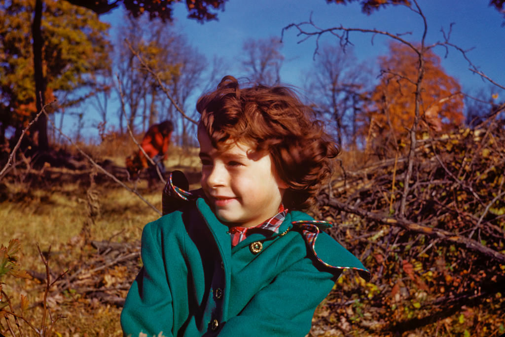 Little girl enjoying fabulous fall day in north of Peoria, IL, 1950