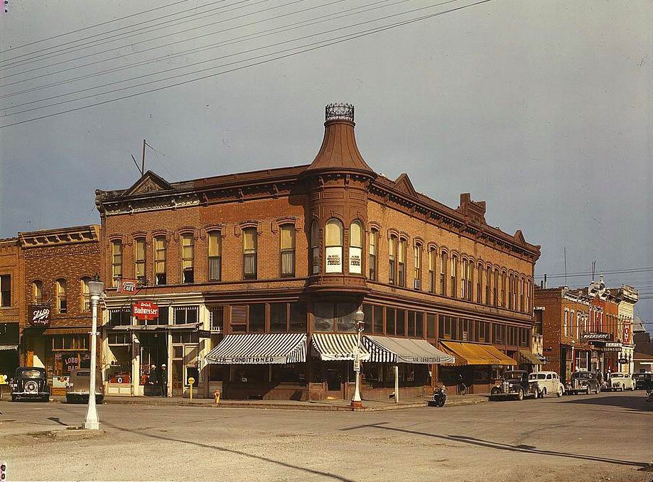 Street corner, Dillon, Mont. Dillon is the trading center for a prosperous cattle and sheep country, 1950s