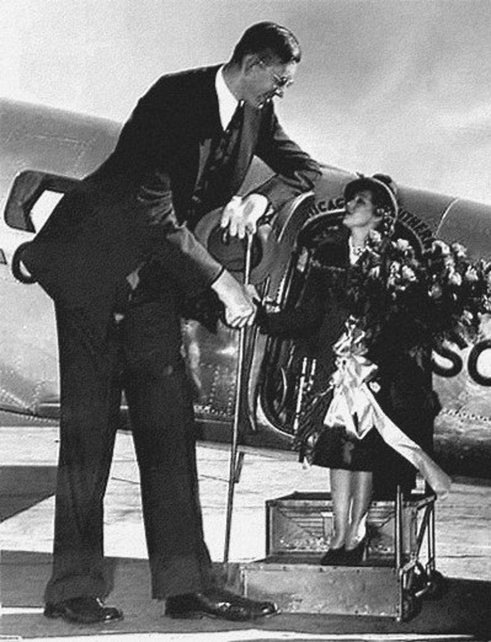 Robert greets Movie star Mary Pickford at the St. Louis airport.