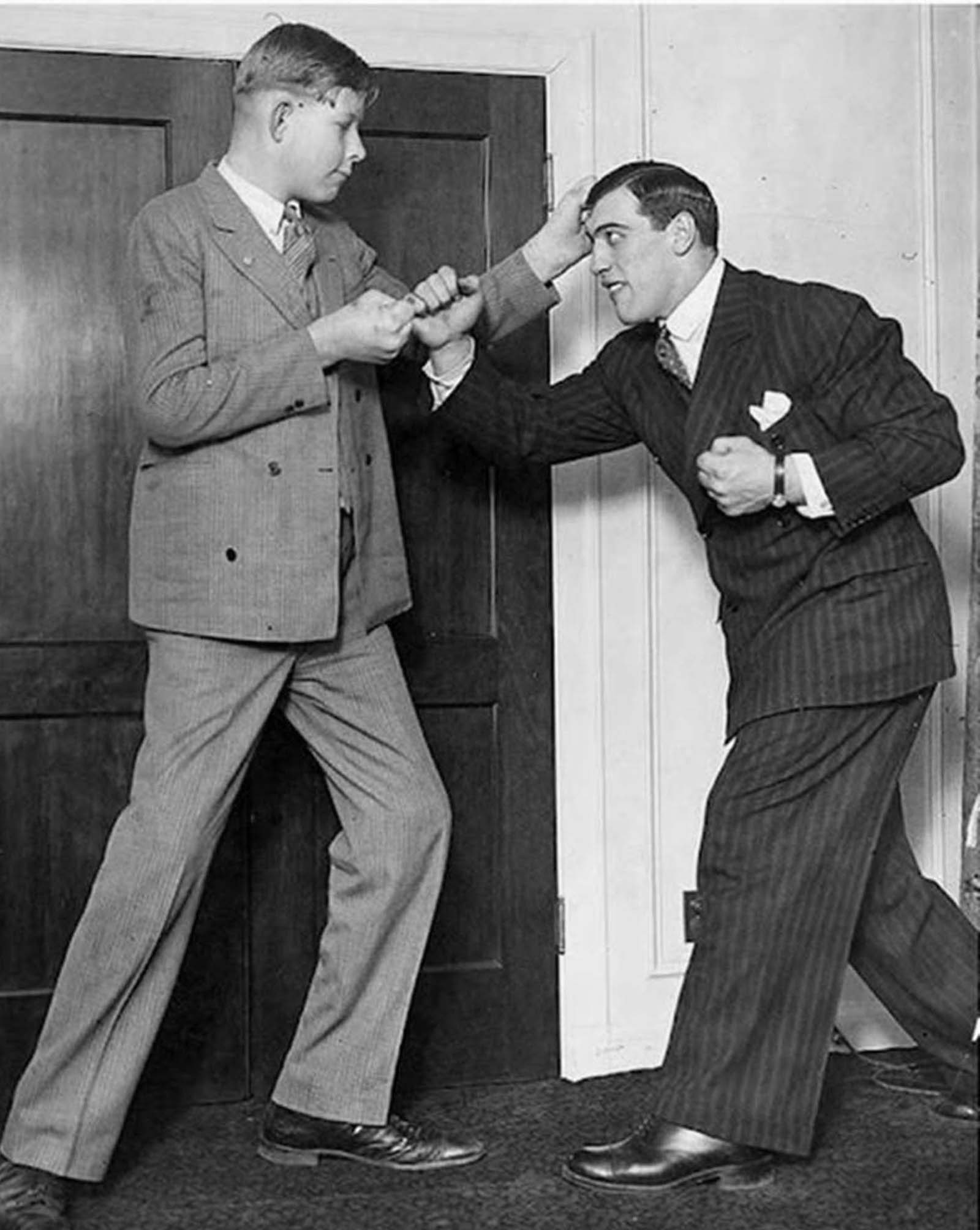 A 12-year-old Robert Wadlow with boxing legend, Primo Carnera. Primo was 6’9″ and Robert was 7’2″.