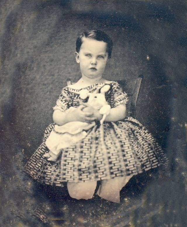Kid with a doll