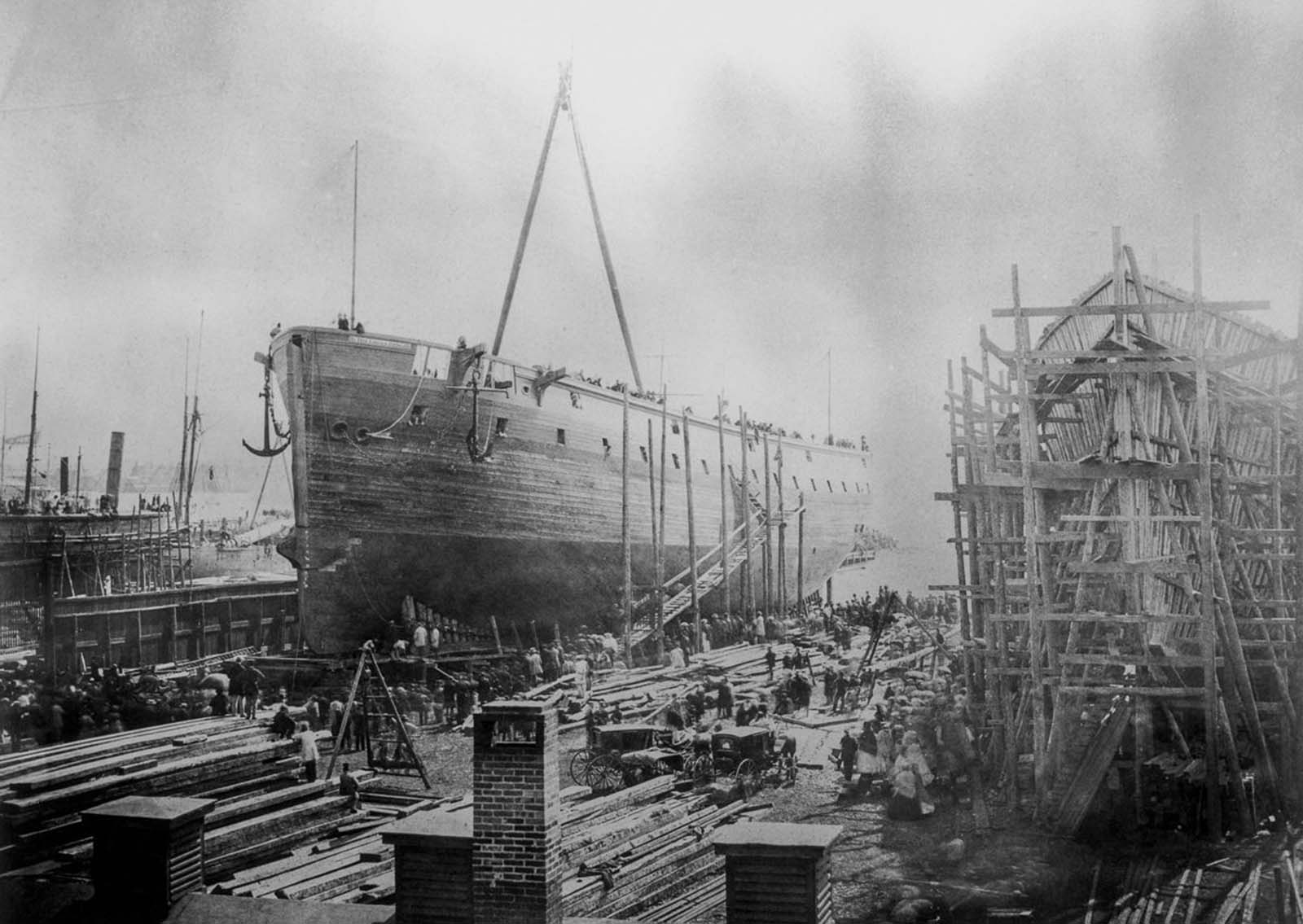 The William H. Webb Shipyard in New York. The ship under construction is the ‘Re Don Luigi di Portogallo,’ an ironclad vessel built for the Italian government.