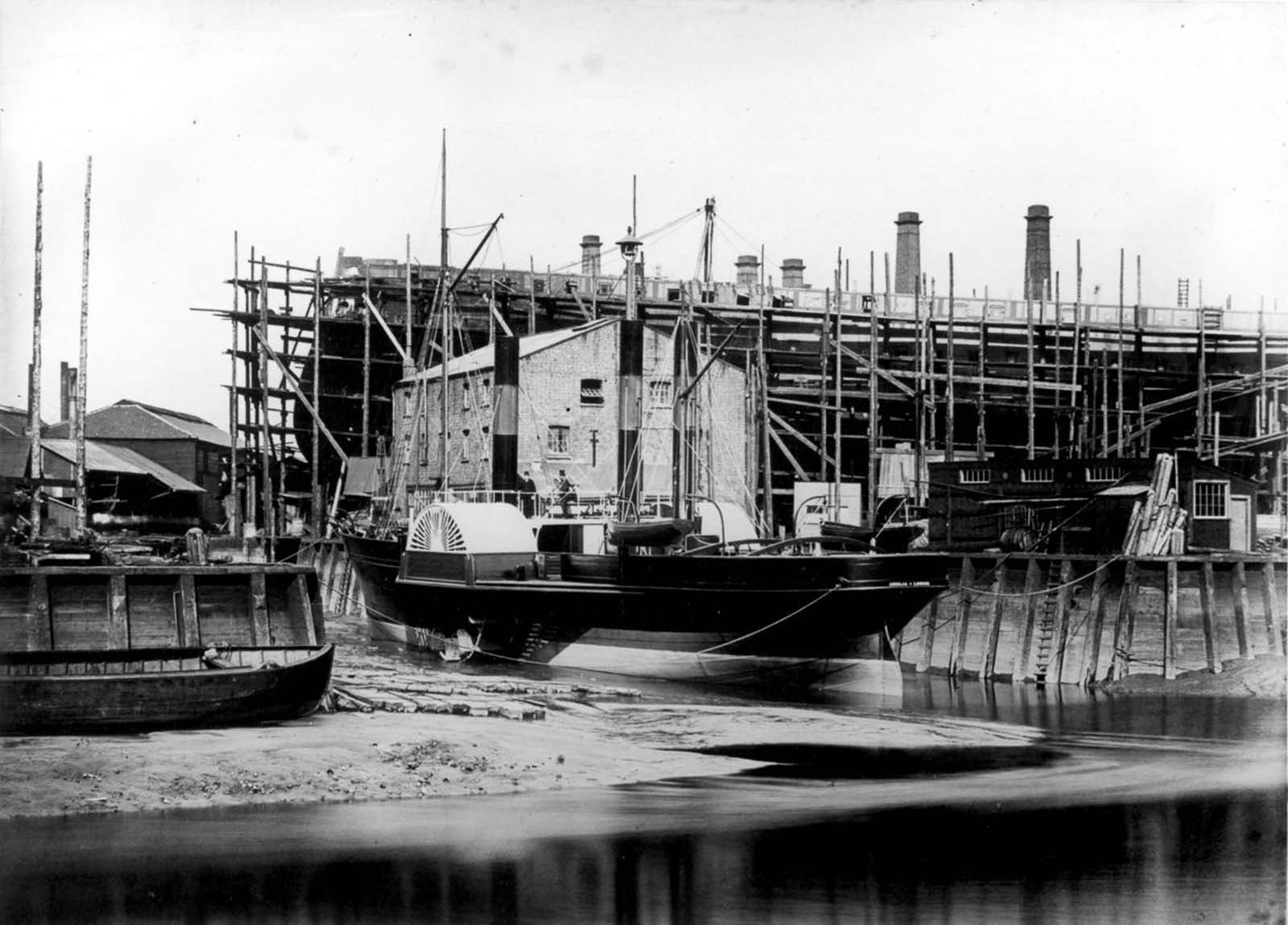 A new open deck steamship moored off the shipyard which produced it in East Anglia, 1866.