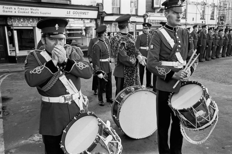 Army bandsmen feeling the November cold, Remembrance Sunday parade, Monmouth, Monmouthshire