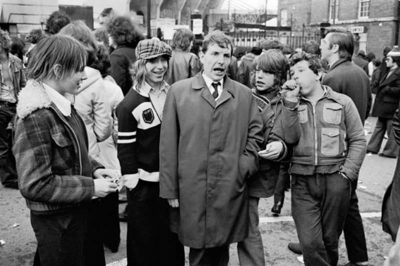 Rugby fans mock a street preacher outside Cardiff Arms Park