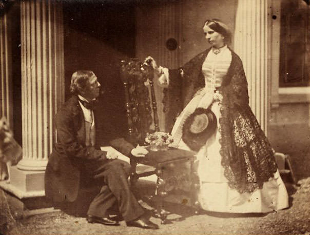 Calvert Richard Jones and woman (possibly Portia Smith, Jones' second wife) in front of a colonnaded building