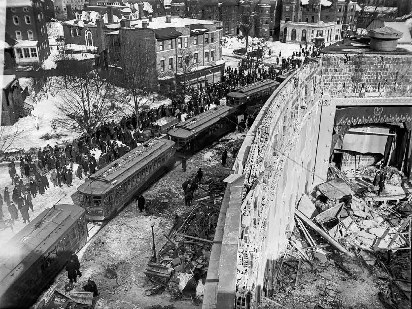 Crowds gather outside the ruins of the collapsed Knickerbocker Theatre.