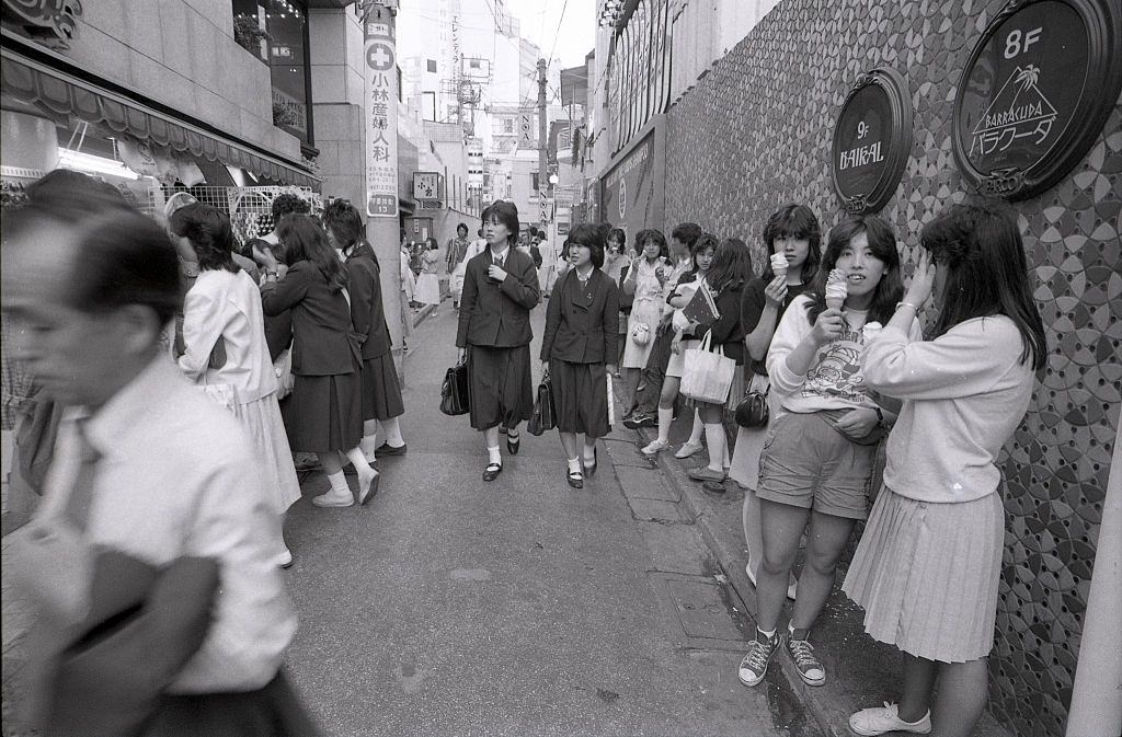 People walk the Spain zaka in Shibuya, Tokyo, 1984