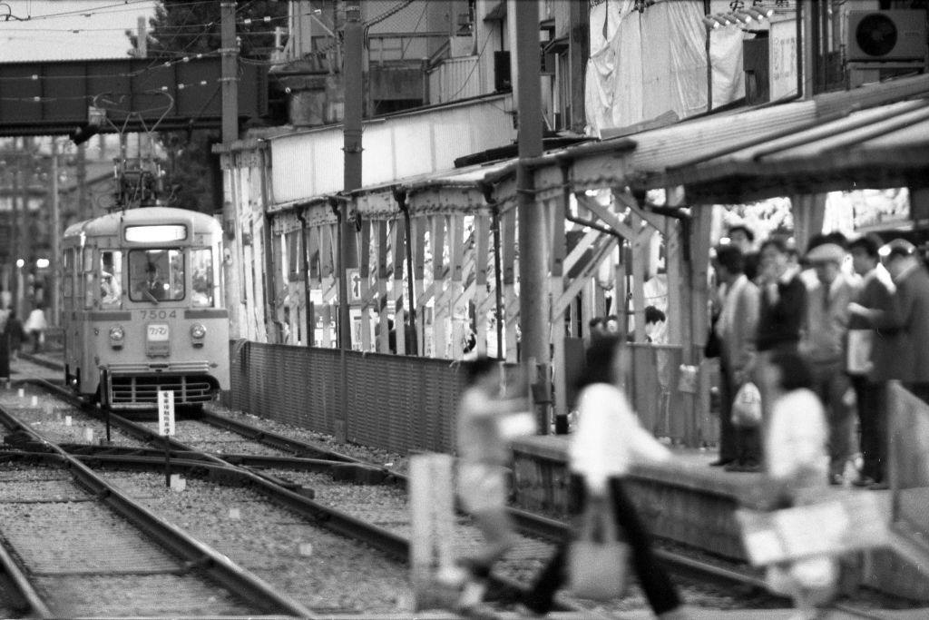 An Arakawa line tram approaches to Machiya Station, Tokyo, 1984