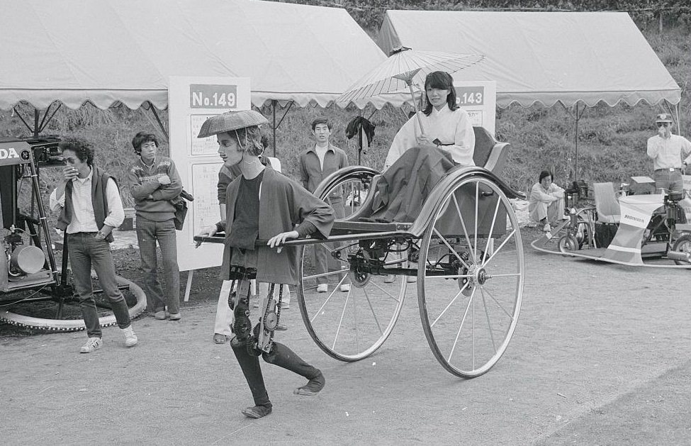 Woman Riding in Robot Driven Rickshaw, 1980s