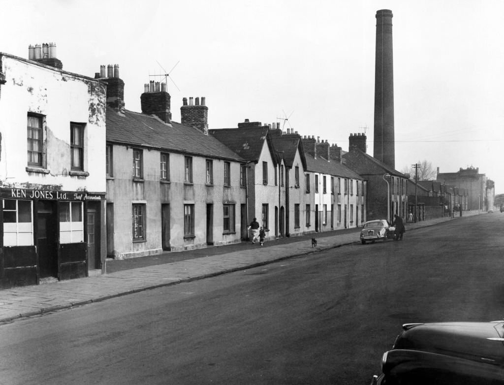 Newtown was a residential area of Cardiff, Wales that existed from the mid-nineteenth century until it was demolished in 1970. Pictured, a street scene, December 1964.