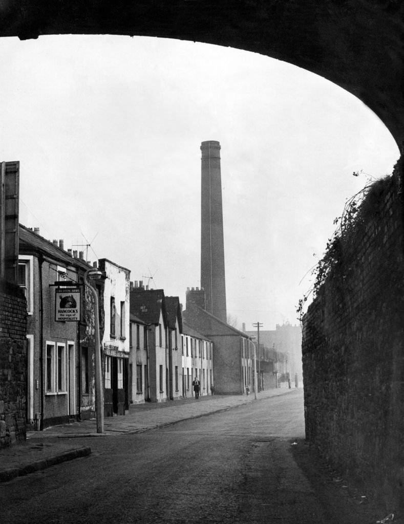 Newtown was a residential area of Cardiff, Wales that existed from the mid-nineteenth century until it was demolished in 1970. Pictured, Tyndall Street, 1964.