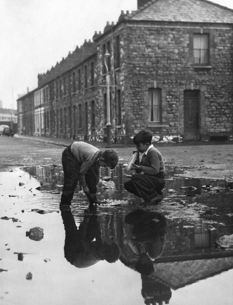 Galston Street in Adamsdown, an inner city area and community in the south of Cardiff, Wales, 23rd January 1961.